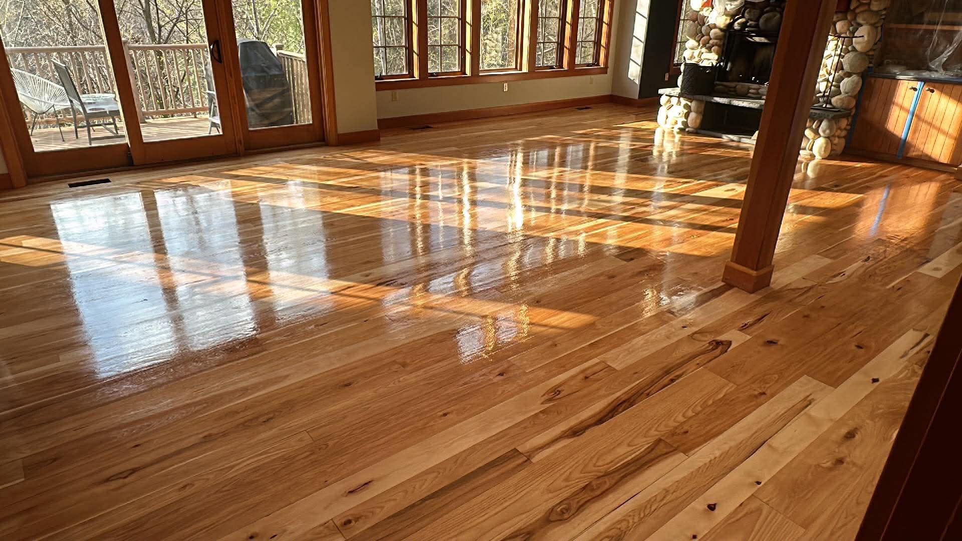 Exeter hardwood floor installation with wide-plank oak boards