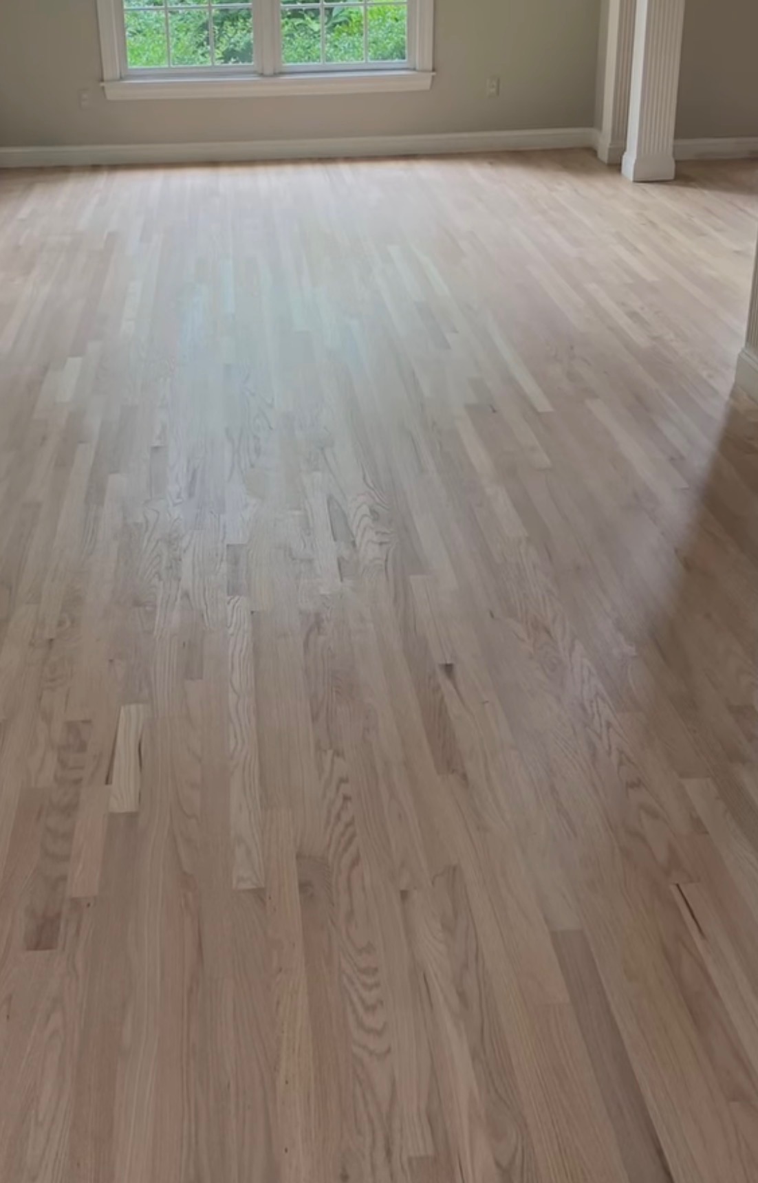 Stratham porcelain tile installation — large-format floor tiles with tight grout lines