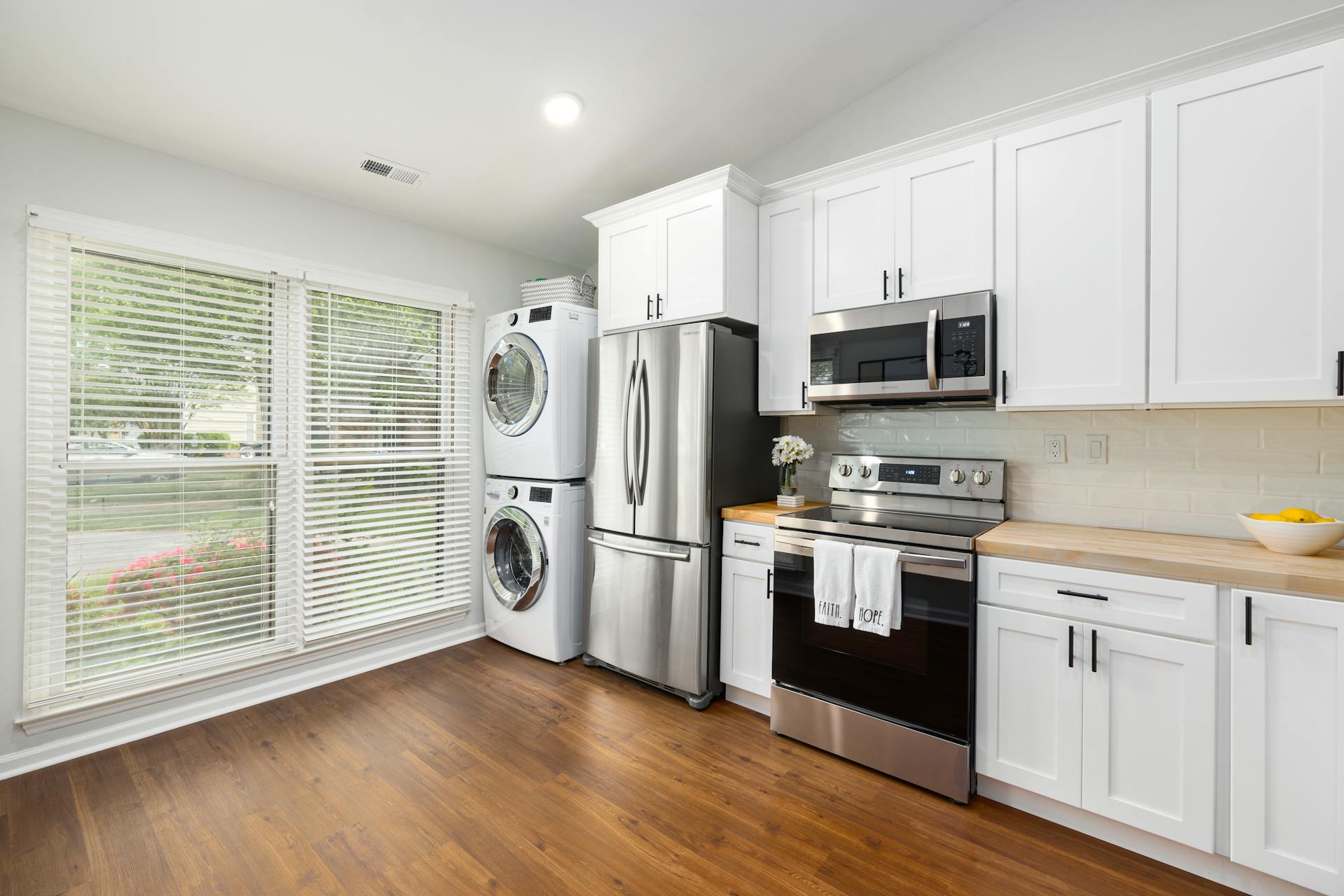 Stratham kitchen remodel with navy island and marble countertops