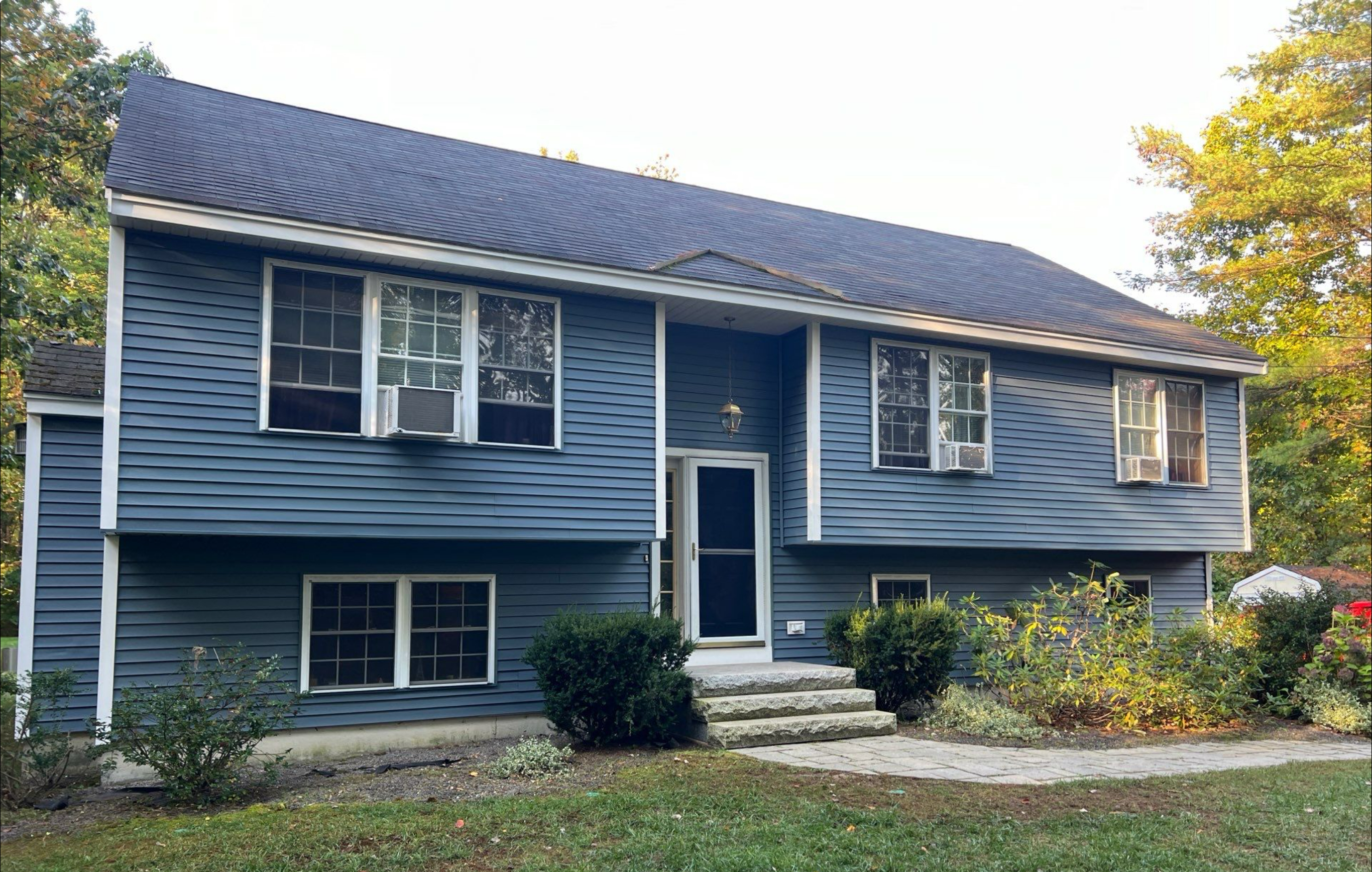 Seabrook vinyl siding installation — new vinyl lap siding with updated exterior trim